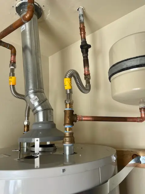 Water heater installation and plumbing repair in Harrison